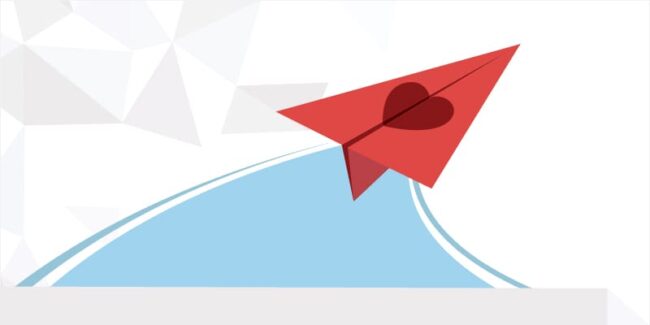 origami paper plane with a heart soaring to sky